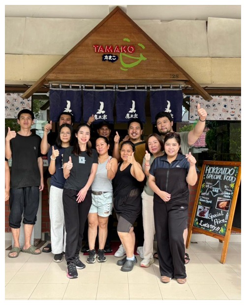The Tamako Meal team outside the restaurant